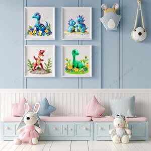 May include: Four framed prints of cartoon dinosaurs with colorful flowers and greenery. The dinosaurs are blue, green, and red. The prints are arranged in a grid on a light blue wall.