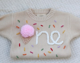 Pull crème personnalisé pour premier anniversaire de bébé en tricot
