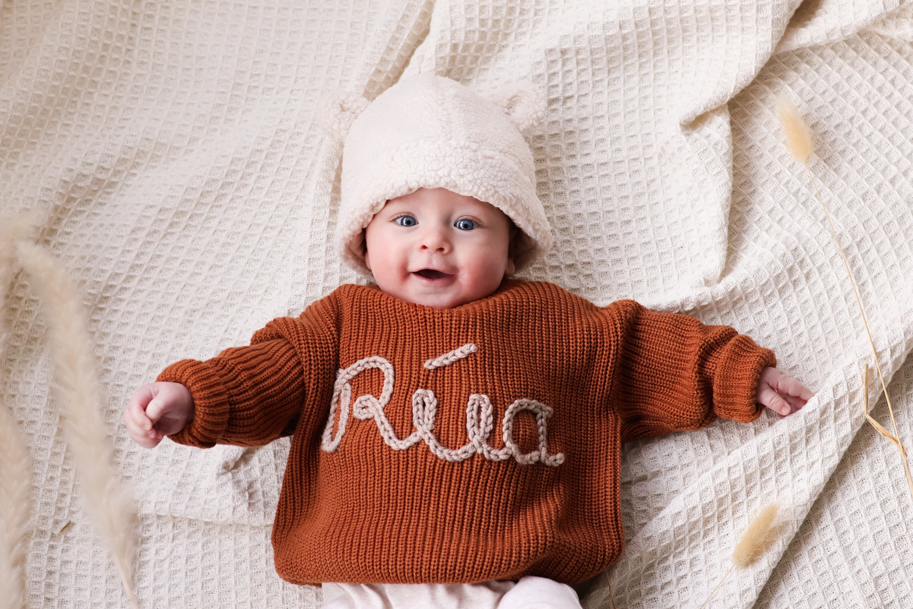 pull bebe garcon avec message brode bleu pulls