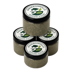 May include: A stack of five small jars of isopod food. Each jar has a black lid with a white label that reads "Aquariumville ISOPOD FOOD" with a fish and a segmented insect graphic. The jars are filled with a gray, granular substance.