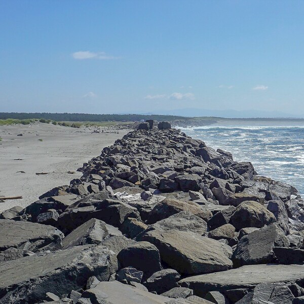 Jetty parting the sea from land at Fort Stevens State Park, Oregon Coast