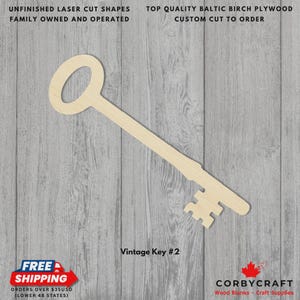 May include: A wooden vintage key cutout. The key is made of light-coloured wood and has a classic key shape with a circular top and a detailed bit. The text "Vintage Key #2" is below the key.