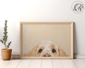 May include: A painting of a dog's face peeking over the top of a frame. The dog has light brown fur and is looking directly at the viewer. The background is a light beige color.