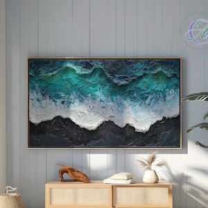 May include: Abstract painting of ocean waves in shades of blue and white, with a dark blue background. The painting is framed in a gold frame and is hanging on a light blue wall.