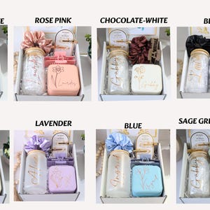 May include: Gift boxes in various colors, each containing a jar, soap, and scrunchie. Colors include dusty blue, rose pink, chocolate, black, white, lavender, blue, and sage green. The text "Gabby", "Alice", and "Ingrid" are visible on the jars.