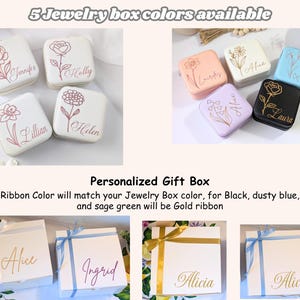 May include: An assortment of personalized jewelry boxes in various colors, including white, pink, lavender, blue, and black. Each box features a floral design and a name. The image also shows gift boxes with ribbons.