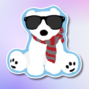 May include: A white polar bear sticker wearing black sunglasses and a red and gray striped scarf. The bear has black eyes and nose, and is outlined in a light blue border. The bear's paws have black paw prints.