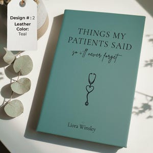 May include: Teal leather journal with the text "THINGS MY PATIENTS SAID so I'll never forget" and a stethoscope design. The journal also includes the name "Liora Winsley". The tag says "Design #: 2 Leather Color: Teal".