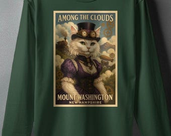 May include: Dark green long-sleeve shirt with a steampunk-themed illustration of a white cat in a top hat and goggles. The image includes the text "AMONG THE CLOUDS" and "MOUNT WASHINGTON NEW HAMPSHIRE".
