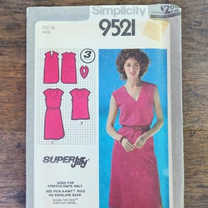 May include: A Simplicity 9521 sewing pattern envelope for a size 16 dress. The front features a photograph of a person wearing a sleeveless, V-neck, magenta dress with a matching belt. Illustrations show three pattern pieces and two garment variations.
