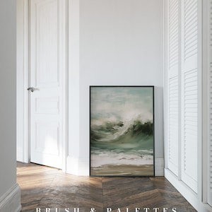 K&ouml;nnte beinhalten: Ein gerahmtes abstraktes Gem&auml;lde einer gro&szlig;en Welle, die an einem Strand bricht. Das Gem&auml;lde ist in Gr&uuml;nt&ouml;nen, Blau und Wei&szlig; gehalten und vor einer wei&szlig;en Wand platziert.