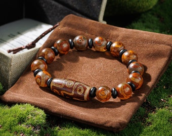 Tibetan Agate Nine Eyes Dzi Bracelet for Protection Sacred Amulet Concentration Handcrafted Gift Spiritual Growth Timeless Good Luck Charm