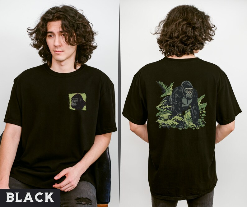 May include: Black t-shirt with a gorilla graphic on the back and a smaller gorilla graphic on the front. The gorilla graphic on the back shows the gorilla walking through a jungle scene.