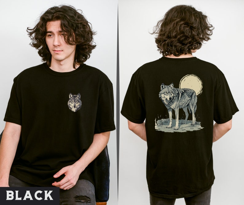 May include: Black t-shirt with a wolf graphic on the front and a wolf and moon graphic on the back.