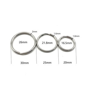 May include: Three silver key rings of different sizes. The largest ring is 5 cm in diameter, the middle ring is 4.5 cm in diameter, and the smallest ring is 4 cm in diameter.