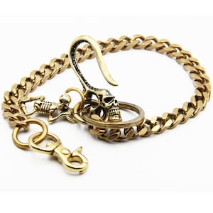 Cadena para billetera de motociclista con diseño de calavera y anzuelo de latón, ideal para accesorios de hombre.