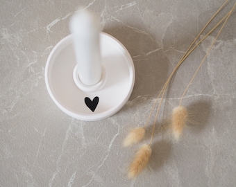 Tapered candle holder with heart