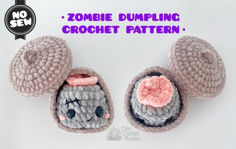 May include: A crochet pattern titled ZOMBIE DUMPLING CROCHET PATTERN with a NO SEW badge. The image displays two plush zombie dumplings in grey yarn with pink tops, black safety eyes, and stitched details, each inside a matching lidded container.