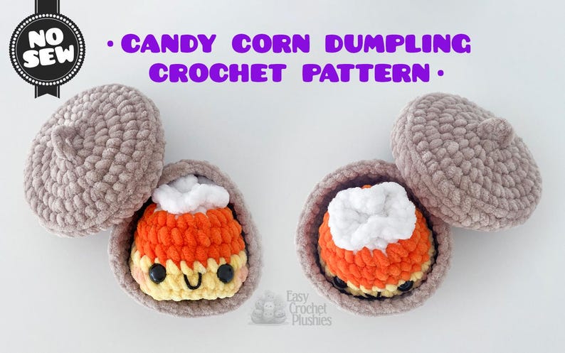 May include: Two crocheted candy corn dumplings with white, orange, and yellow yarn, each featuring black safety eyes and a small smile. They are nestled inside brown crocheted acorn-shaped shells. Text reads: NO SEW CANDY CORN DUMPLING CROCHET PATTERN.