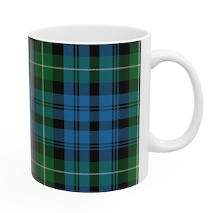 Lamont-Clan. Das elegante und farbenfrohe Tartanmuster auf dieser Tasse stammt aus dem Scottish Register of Tartans mit Sitz in Schottland. Bild 1