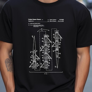 Może przedstawiać: Czarno-biały rysunek patentowy łodzi wioślarskiej. Rysunek przedstawia łódź z boku i zawiera szczegóły konstrukcji i projektu. Numer patentu to 5 474 005, a data to 12 grudnia 1995.