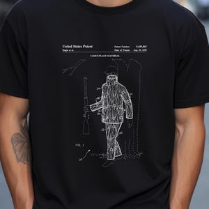 Design of camouflage clothing for a hunter from the US Patent Office. T-shirt gift for hunters, outdoor sport, hunting,