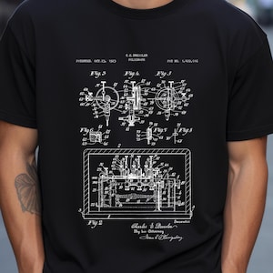 May include: A black and white illustration of a polygraph patent, showing a detailed diagram of the device's inner workings. The patent is titled "C.E. Dressler Polygraph" and includes the patent number "1,472,016".