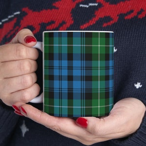Lamont-Clan. Das elegante und farbenfrohe Tartanmuster auf dieser Tasse stammt aus dem Scottish Register of Tartans mit Sitz in Schottland. Bild 2