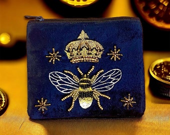 Monedero azul real con detalles de abeja dorada