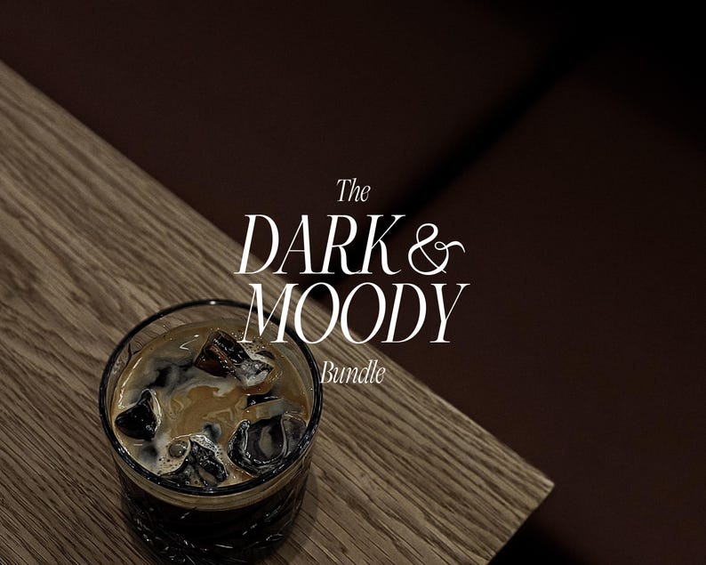 May include: A glass of iced coffee with ice cubes, on a wooden surface. The text "The Dark & Moody Bundle" is displayed in white script. The background is a dark brown color.