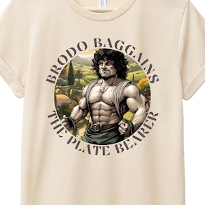 Funny 'Brodo Baggains The Plate Bearer' T-Shirt - Cartoon Bodybuilder Halfling - Fantasy Gym Bro Meme Tee - 6 Colors - Sizes Small to XXL