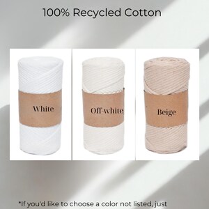 May include: Three spools of 100% recycled cotton in white, off-white, and beige. Each spool is wrapped with a brown paper band indicating the color. The text "100% Recycled Cotton" is at the top. The text "If you'd like to choose a color not listed, just message me!" is at the bottom.