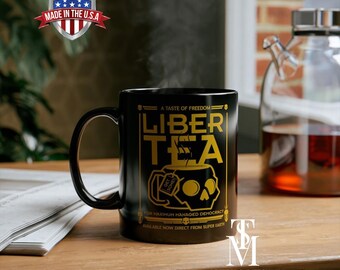 The Liber-Tea Helldivers 2 Mug, Helldivers Taste Democracy Black Mug (11 oz, 15 oz), and Morning Cup of Liber-Tea are available Mugs