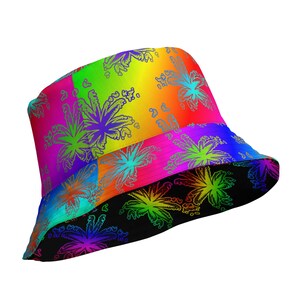 May include: A bucket hat featuring a vibrant rainbow gradient background with a repeating pattern of stylized leaf outlines. The top section displays bright transitions of red, orange, yellow, green, and blue, while the brim has a black base.