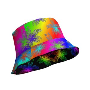 May include: A bucket hat featuring a vibrant rainbow gradient background with a repeating pattern of stylized leaf outlines. The top section displays bright transitions of red, orange, yellow, green, and blue, while the brim has a black base.