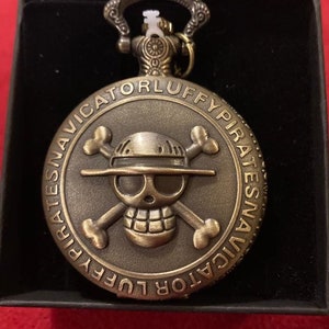 One Piece pocket watch for gifting or collecting. Skull Luffy