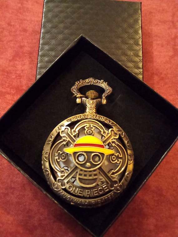 One Piece pocket watch, perfect for gifting or collecting. Features Luffy and Brook skulls.