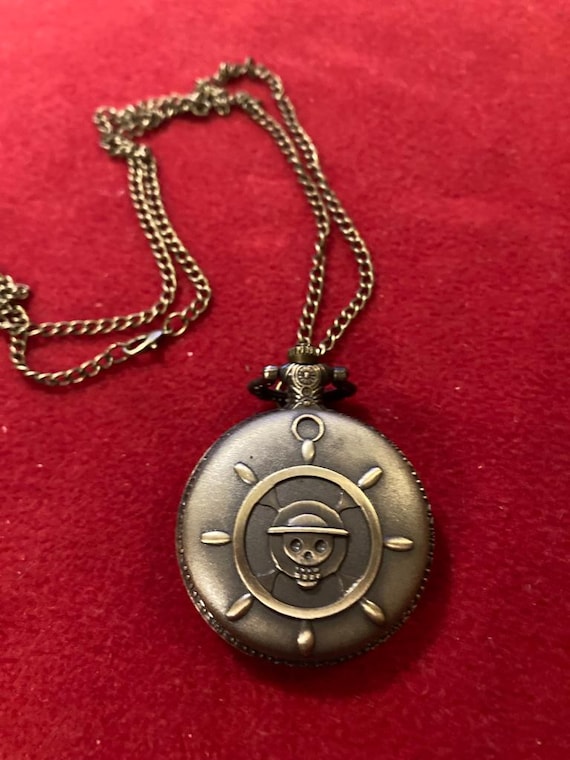 One Piece pocket watch for gifting or collecting. Skull Luffy