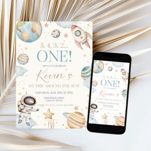 May include: A birthday invitation with an outer space theme. The invitation features planets, stars, a rocket, and an astronaut. The text reads "5, 4, 3, 2... ONE!" and "Kevin's 1st Trip Around the Sun!"
