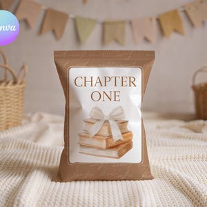 May include: A brown snack bag with a white rectangular center panel featuring the text CHAPTER ONE in brown letters above an illustration of three stacked books tied with a white ribbon. The bag has a light brown script pattern background.