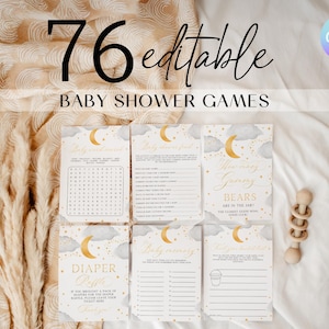 May include: Baby shower games set with a celestial theme. The cards feature a gold crescent moon and stars design. The text on the cards reads "76 editable Baby Shower Games". A wooden rattle is also visible.