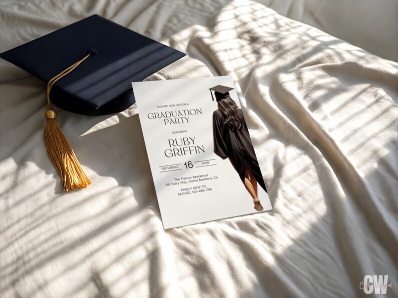 May include: White graduation party invitation with black text. The invitation features a black and white photo of a graduate wearing a cap and gown. The text reads "Please join us for a Graduation Party honoring Ruby Griffin Saturday June 16 The Falcon Residence 66 Ferry Way, Santa Barbara, CA Kindly RSVP to Rachel 123-456-789".