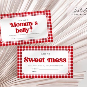 May include: Two red and white gingham baby shower game cards. The first card says "How big is Mommy's belly?" and the second card says "Guess the Sweet Mess. Guess which candy bar made the sweet mess?"