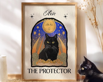 May include: Framed art print depicting a black cat with yellow eyes, set against a celestial backdrop with a moon and stars. The print is labelled "Olive THE PROTECTOR" in black text, framed in light wood.