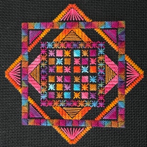 May include: A vibrant, geometric needlepoint design on a black background. The square pattern features a central grid of small squares in various colours, surrounded by larger shapes in shades of orange, pink, purple, and blue. The design is symmetrical and detailed.