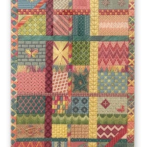 May include: A detailed textile with a patchwork design, showcasing a variety of stitched patterns. The piece uses a palette of pink, green, yellow, and blue. The border has a decorative stitched edge, with a variety of geometric shapes.