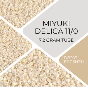 May include: A close-up of a tube containing 7.2 grams of Miyuki Delica 11/0 seed beads in the colour Eggshell (DB203). The beads are small, round, and have a pearly finish.