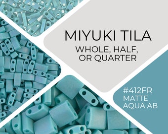 May include: A close-up of turquoise blue Miyuki Tila beads in various sizes, including whole, half, and quarter beads. The beads are matte and have an aqua ab finish. The text on the image reads "Miyuki Tila Whole, Half, or Quarter" and "#412FR Matte Aqua AB".
