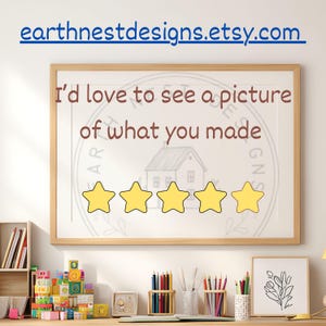 May include: A framed print with the text "I'd love to see a picture of what you made" and five yellow star ratings. The Etsy shop URL "earthnestdesigns.etsy.com" is at the top. The print is displayed on a desk with colorful toys and art supplies.