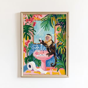 May include: A framed art print shows a monkey in a bathroom, squeezing toothpaste. The scene is vibrant with pink, green, and blue hues, featuring a pink sink, tropical plants, and a roll of toilet paper. The monkey is the focal point.